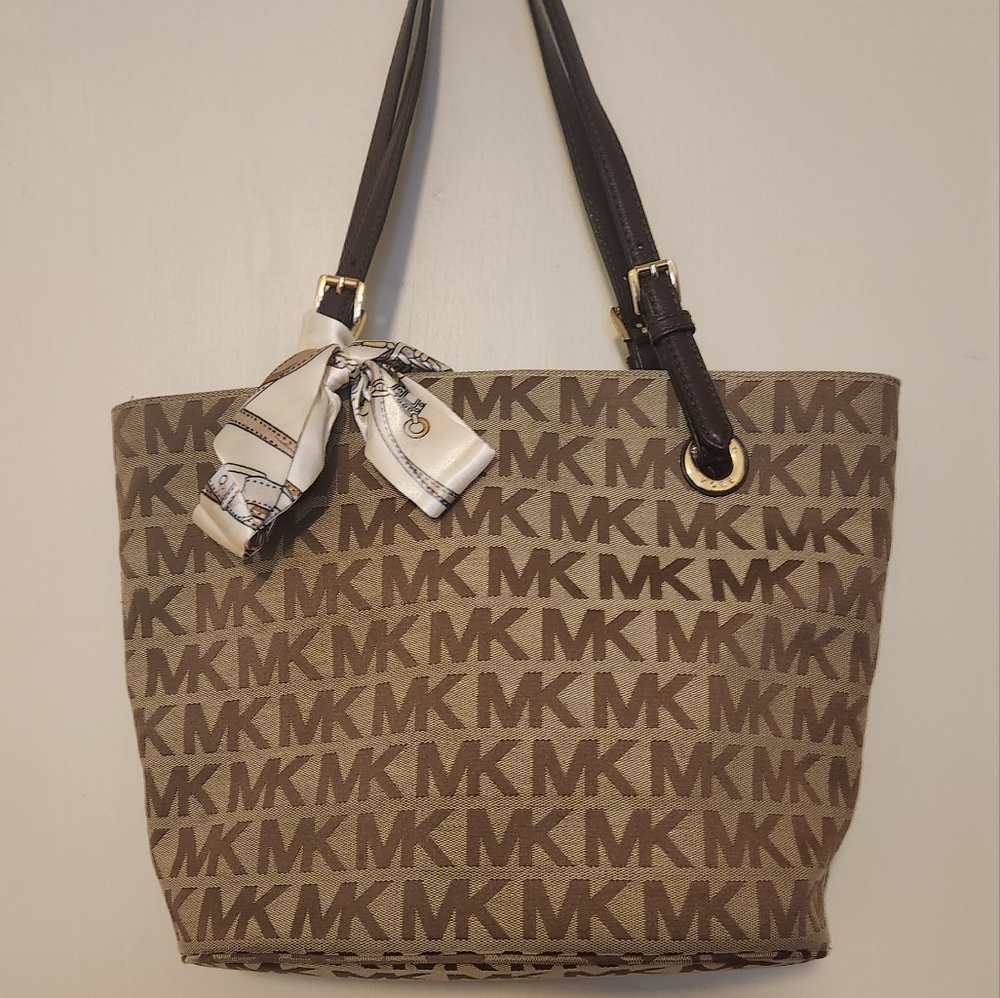 Tan and brown Coach purse large